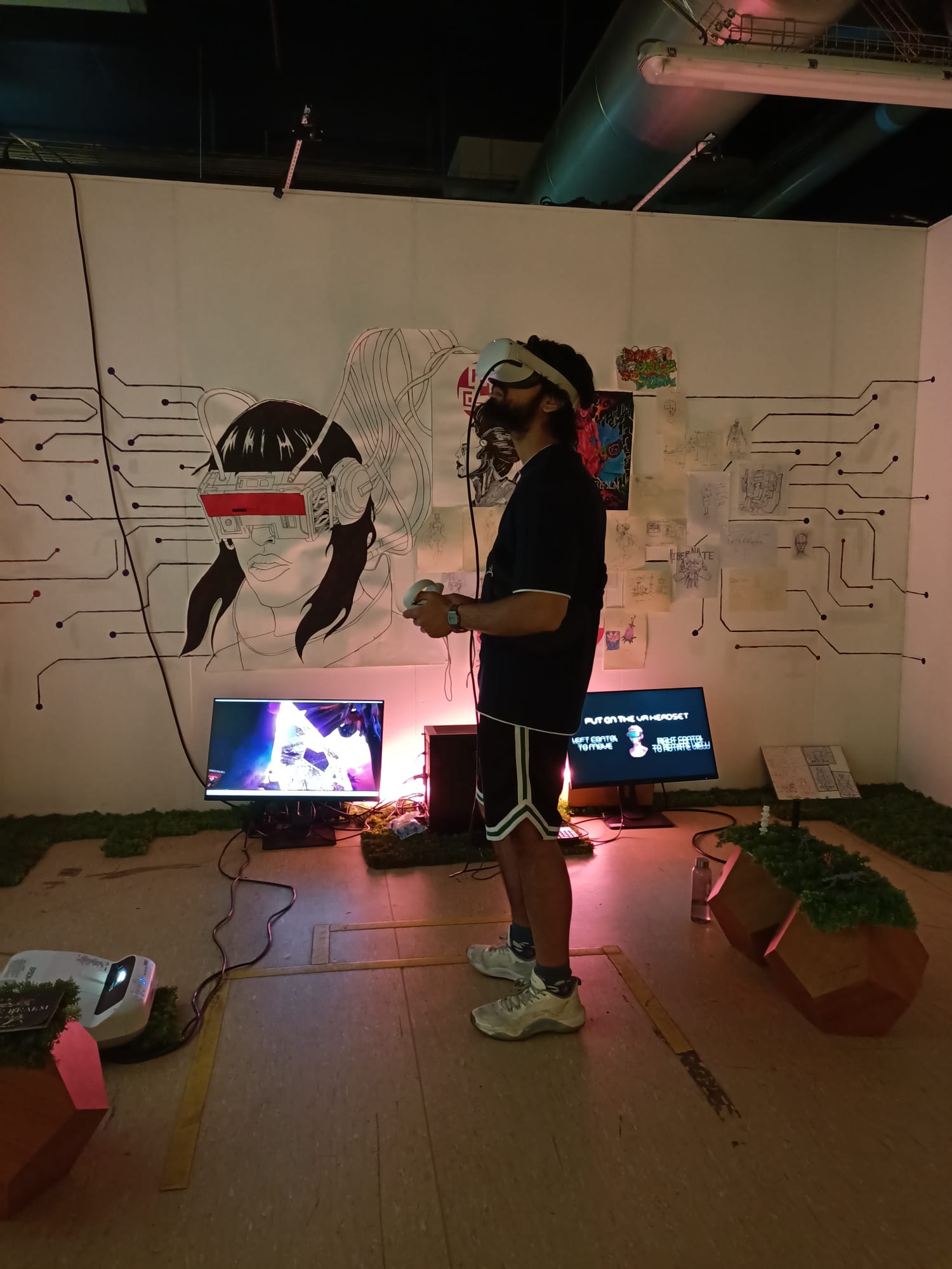 Visitor in VR standing at the circuit mural wall